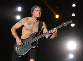 Flea playing the Bass at a Concert