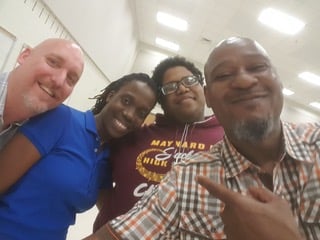 Scott Keiklak of AIMM and James Caldwell of MEG with Omarion Brown Maynard H. Jackson High School 