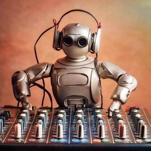 a picture of a robot performing as a DJ