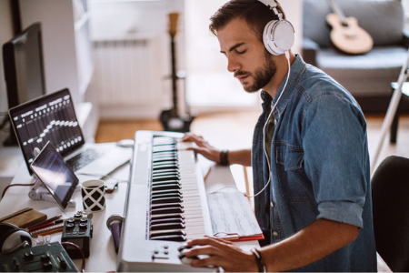 Music Student playing the electronic keyboard