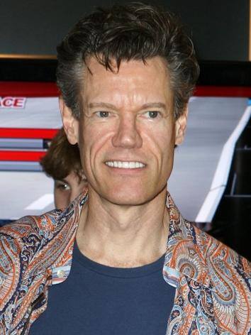 a picture of country music star Randy Travis who's voice was brought back to music despite health issues