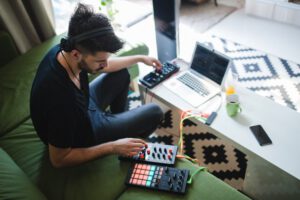 music producer working remotely in a global digital music production environment